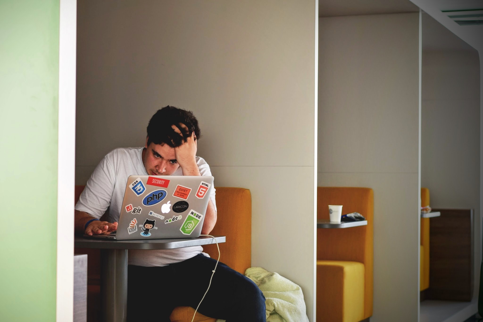 Man stressed at his computer