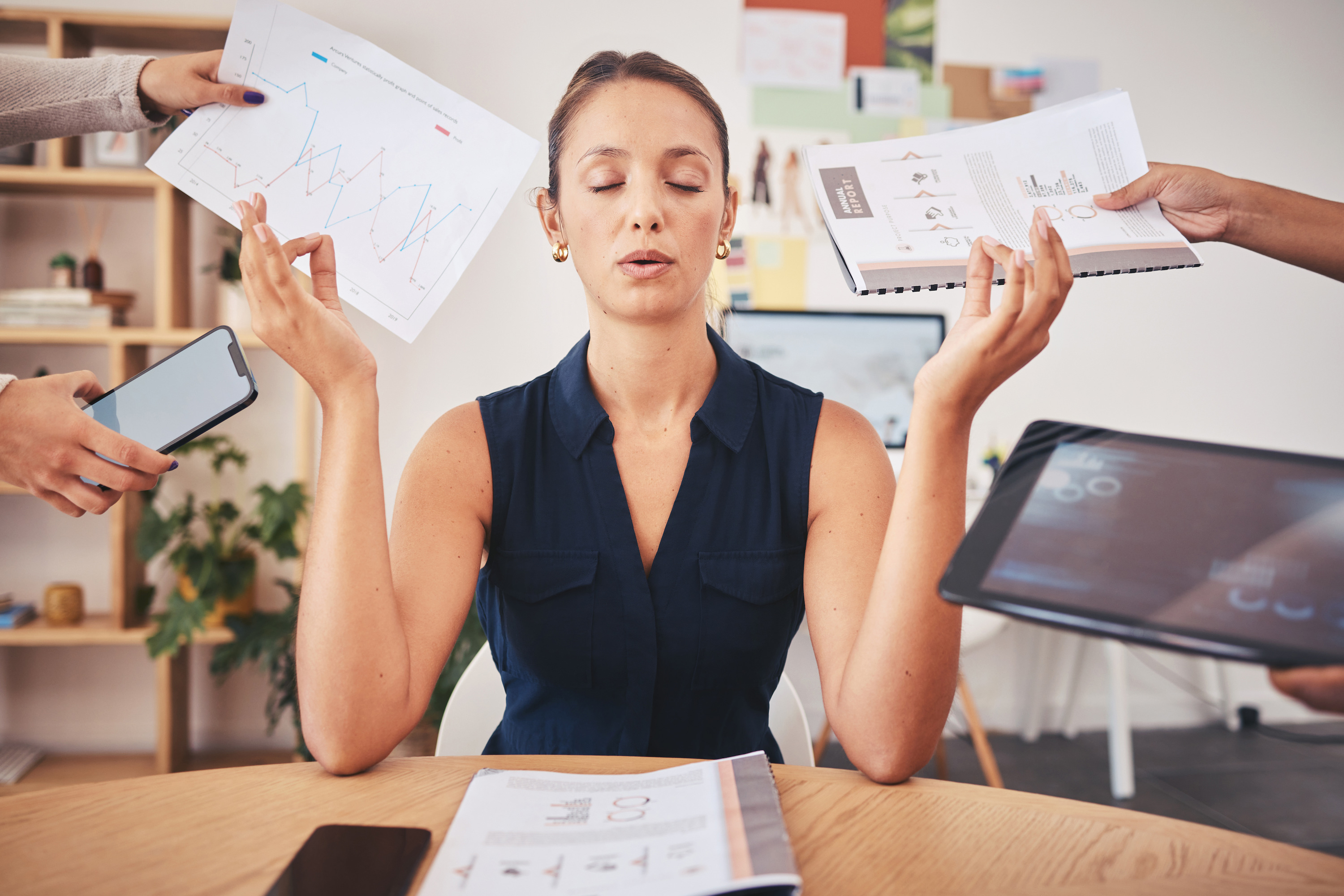 Woman being asked to do many things from 4 different people.